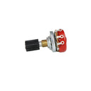 A Mojotone 150KL wah guitar potentiometer laid on its side with a red dust cap on the bottom of the potentiometer. 
