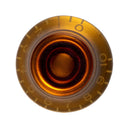 A Mojotone top hat guitar knob in amber with numbers 1-10 in increments along the bottom of the knob.